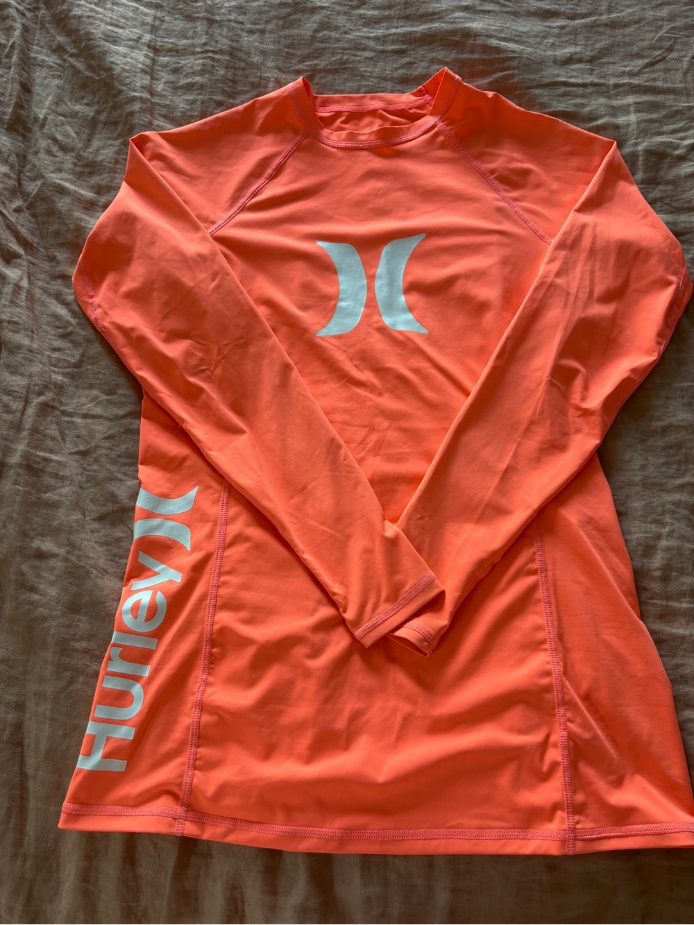Hurley Women’s Long Sleeve Rash Guard in Coral Orange